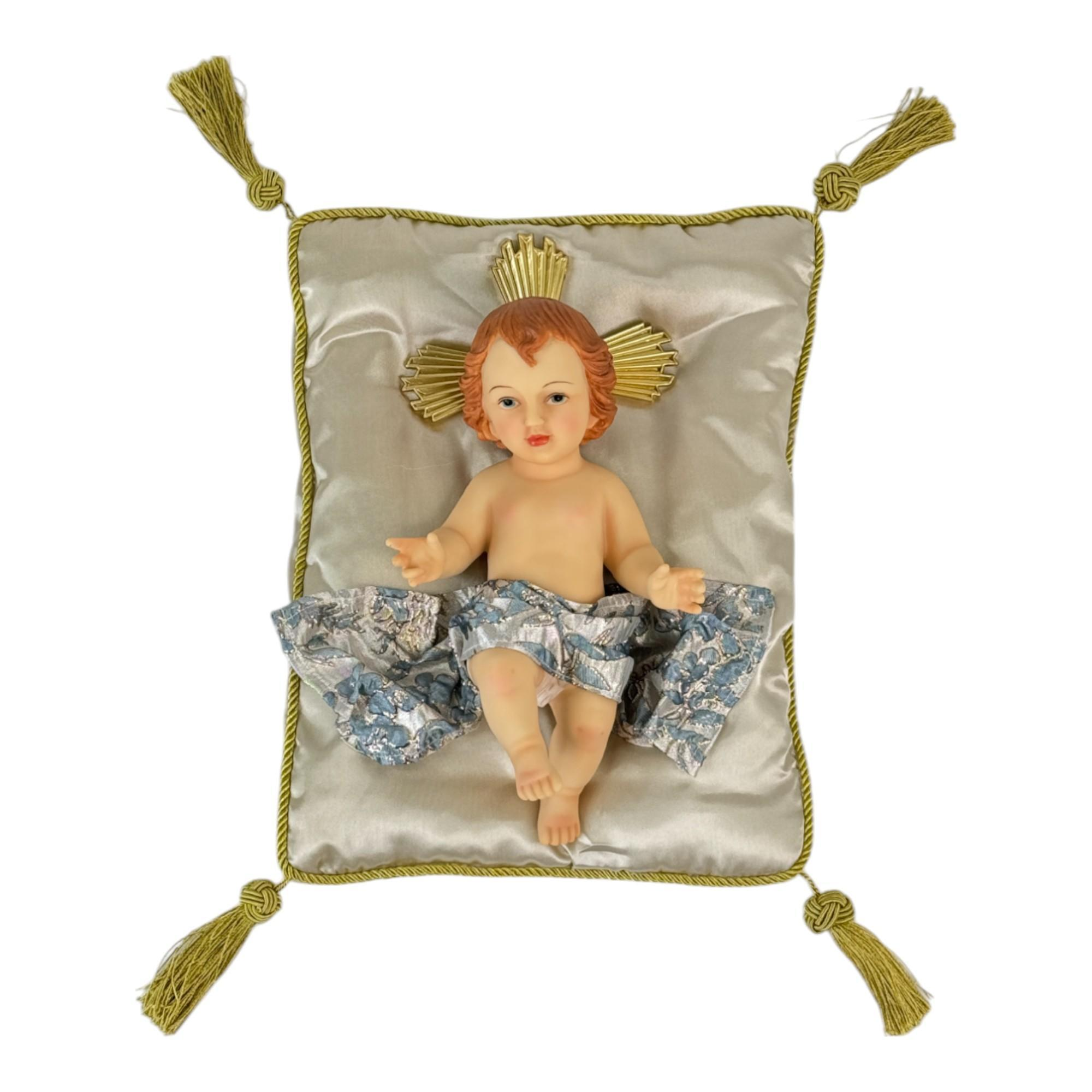 Figura Niño Jesús túnica blanca sobre cojín
