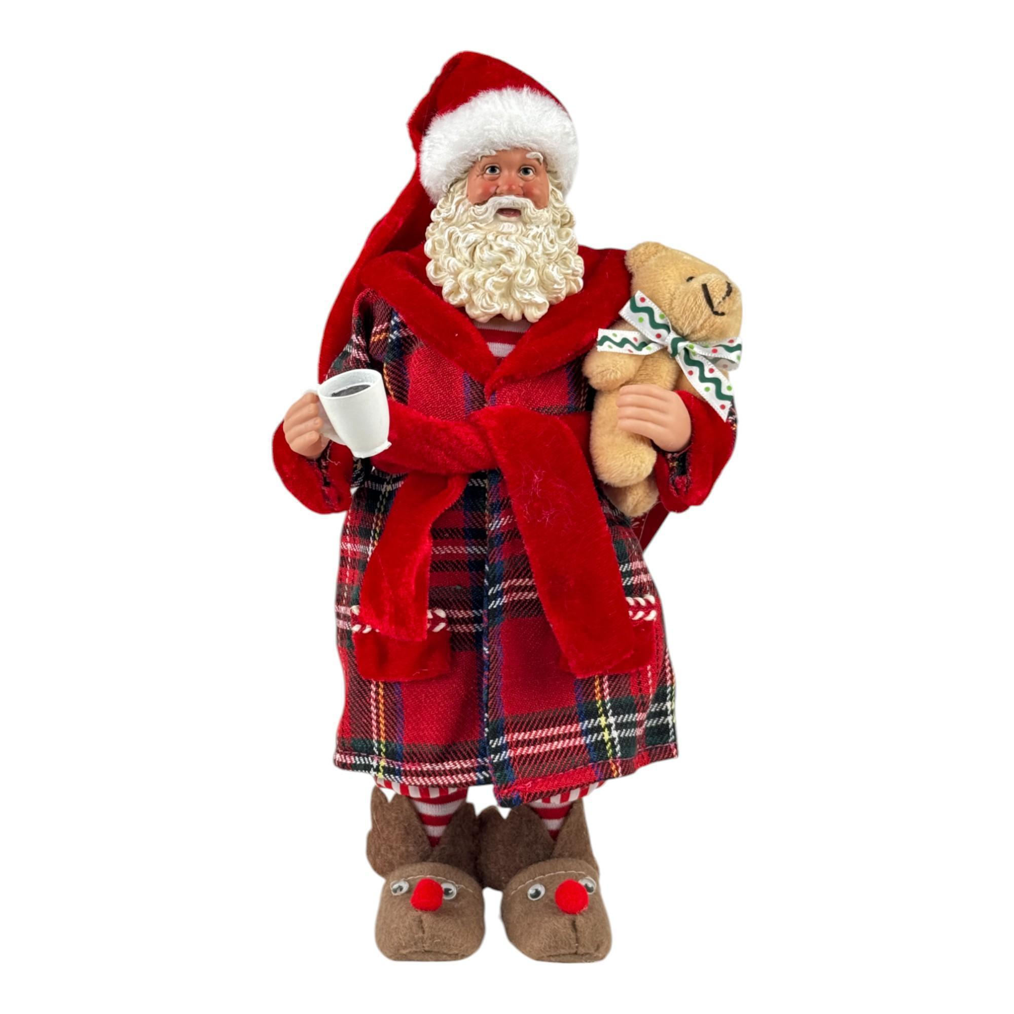 Santa Claus con bata y peluche