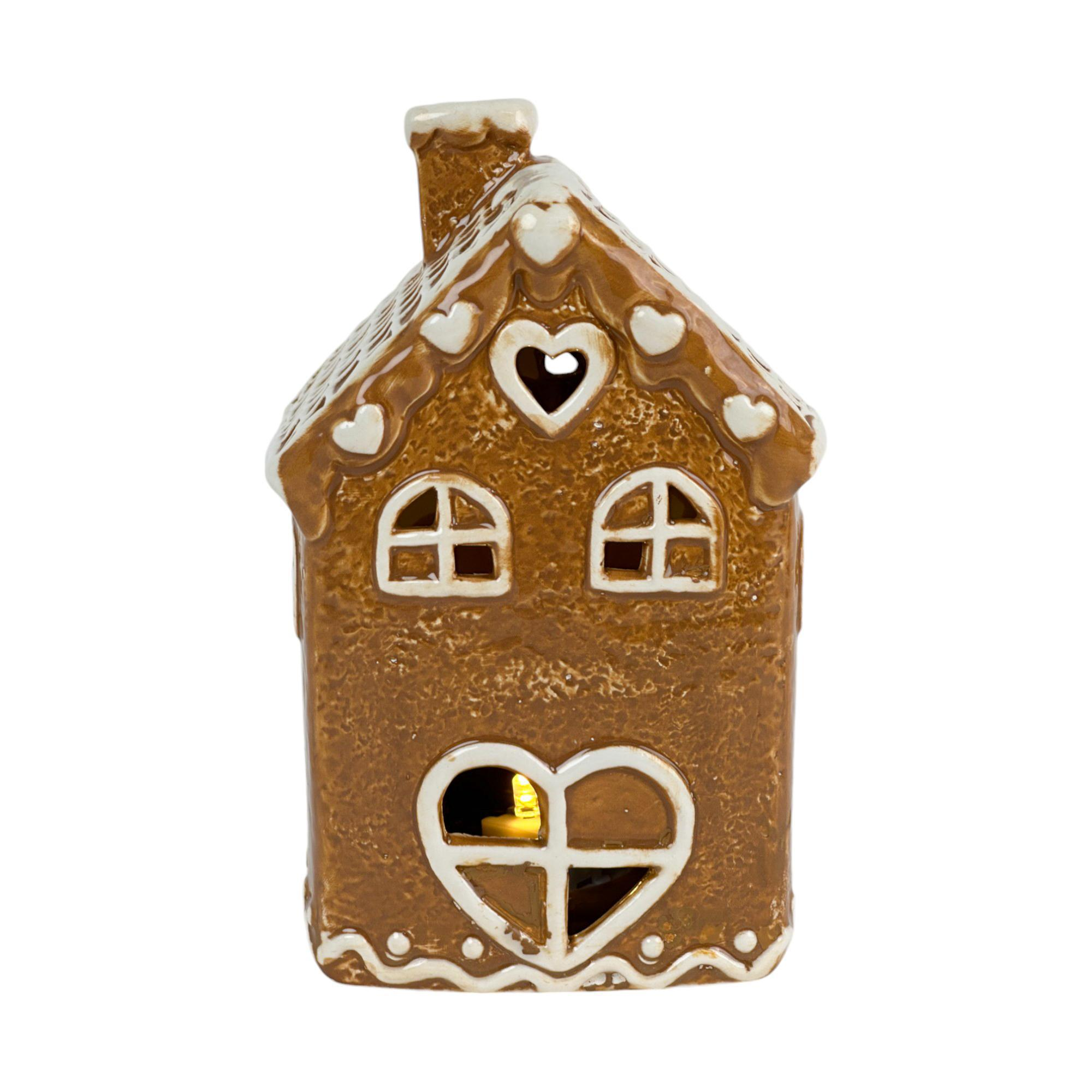 Casa navideña de jengibre con corazón