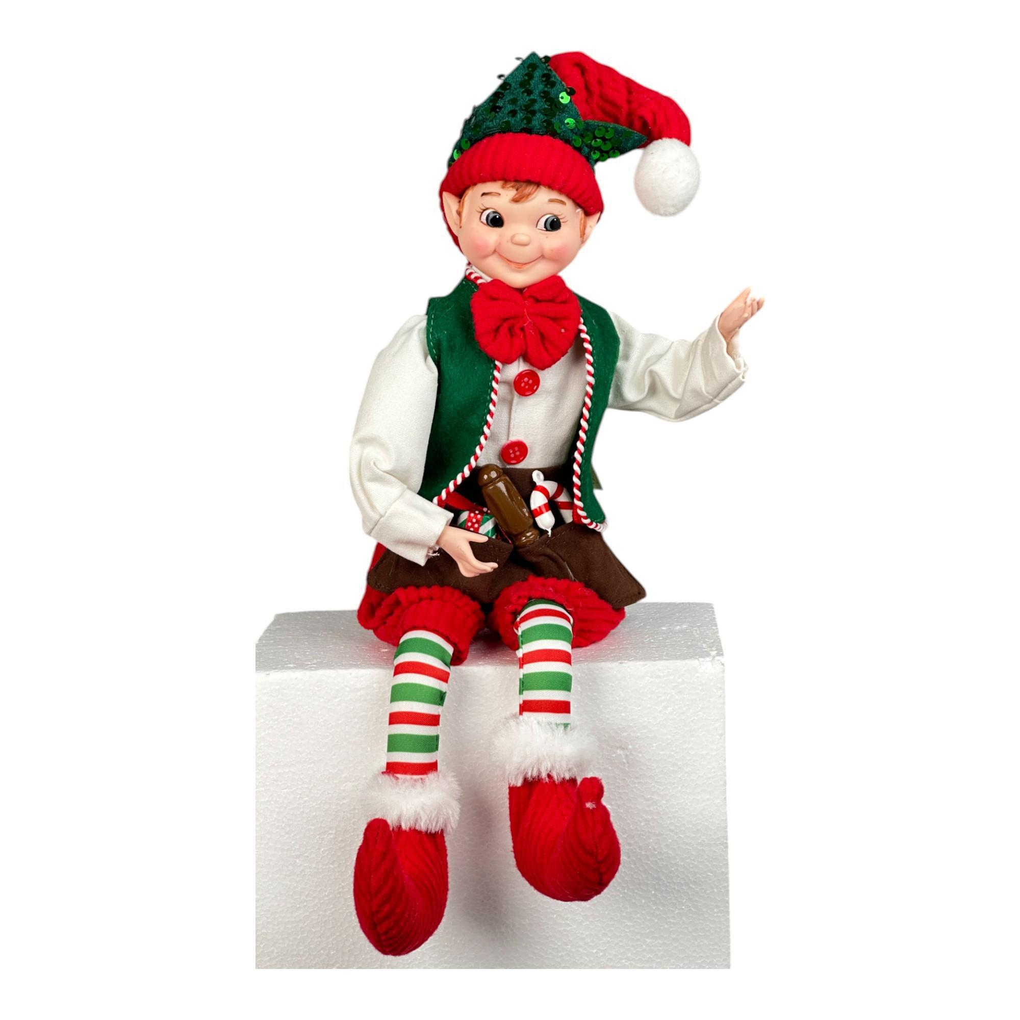 Duende navideño sentado con lista
