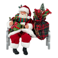 Santa Claus en banca con saco de regalos