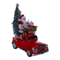 Auto navideño con Santa y Árbol