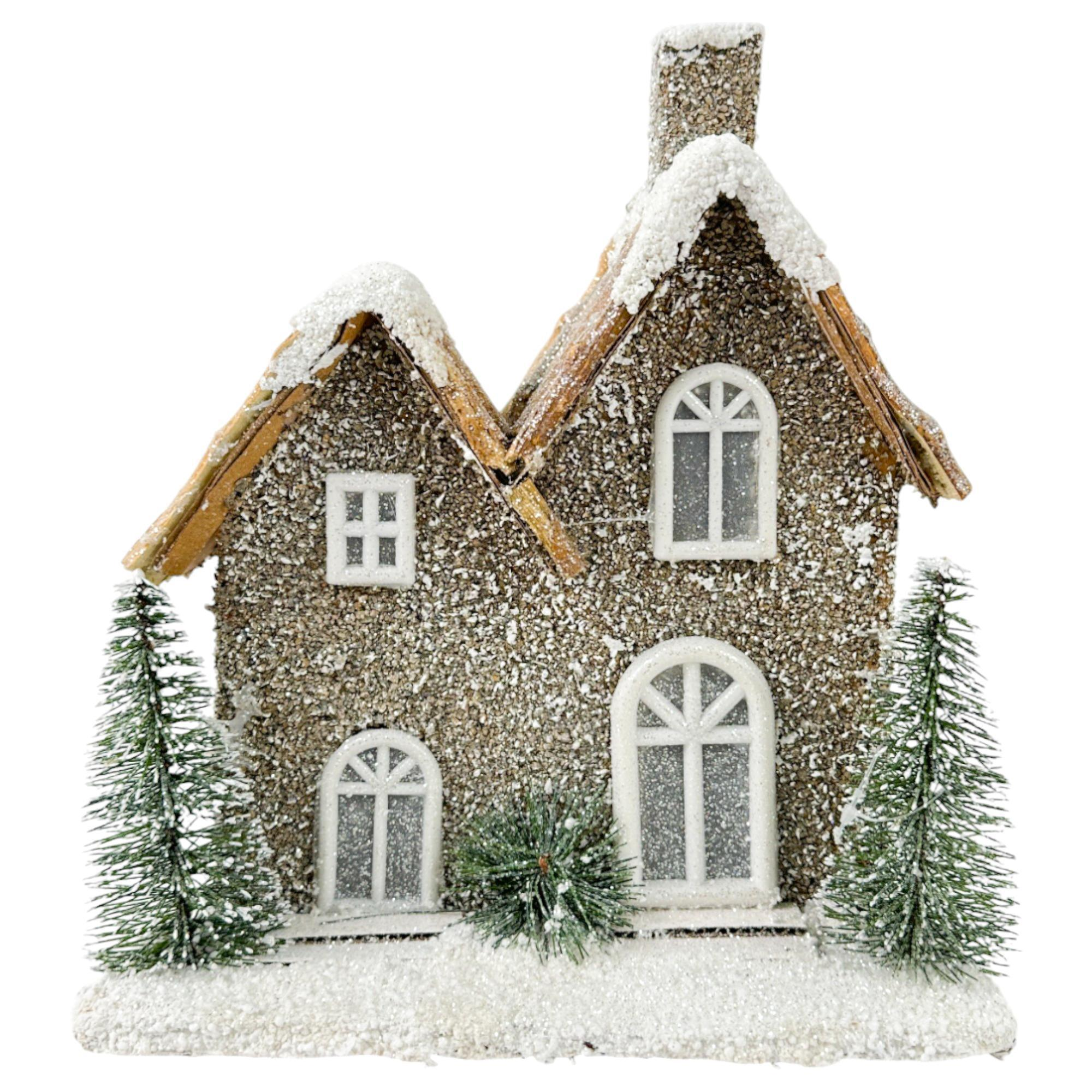 Casita doble con nieve y pinos